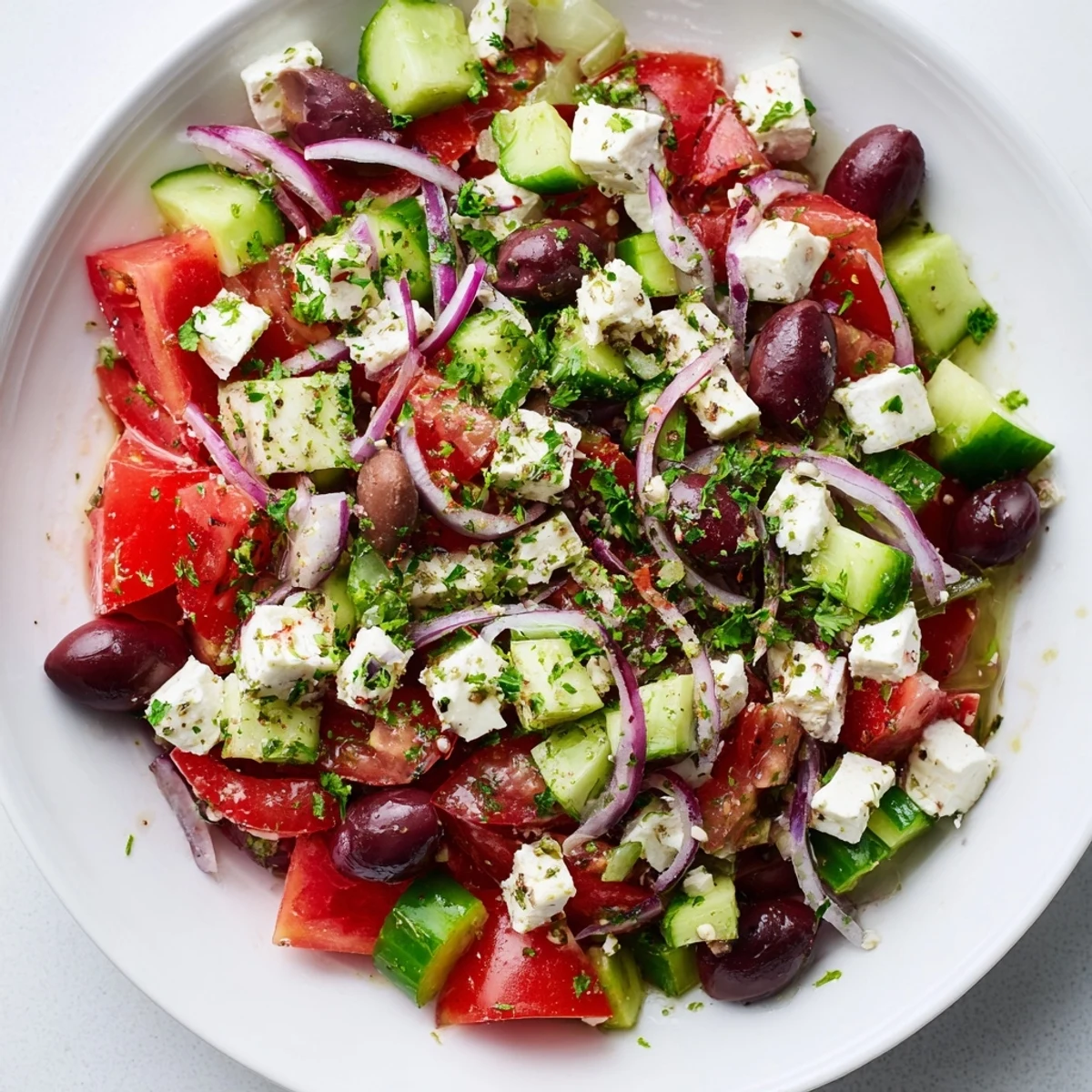 Refreshing Mediterranean Salad: imagine the bright flavors of tomatoes, cucumbers, and Kalamata olives.