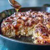 Classic Soul Food Cornbread Skillet with Honey Butter, golden and fluffy, baked in a cast-iron skillet for a crispy crust.