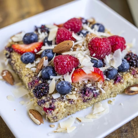 Warm, comforting Berry Quinoa Breakfast Bake, showcasing vibrant berries and a nutty quinoa base, ready to enjoy.